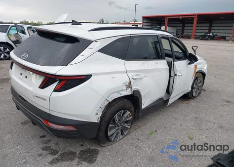 2022 Hyundai Tucson Hybrid Blue z USA, uszkodzony, nr VIN KM8JBCA1XNU020744